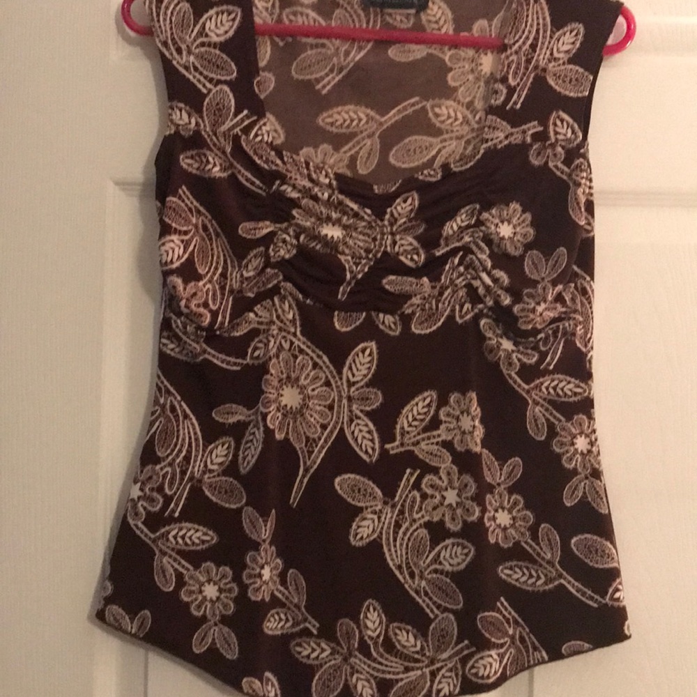Brown and white tank